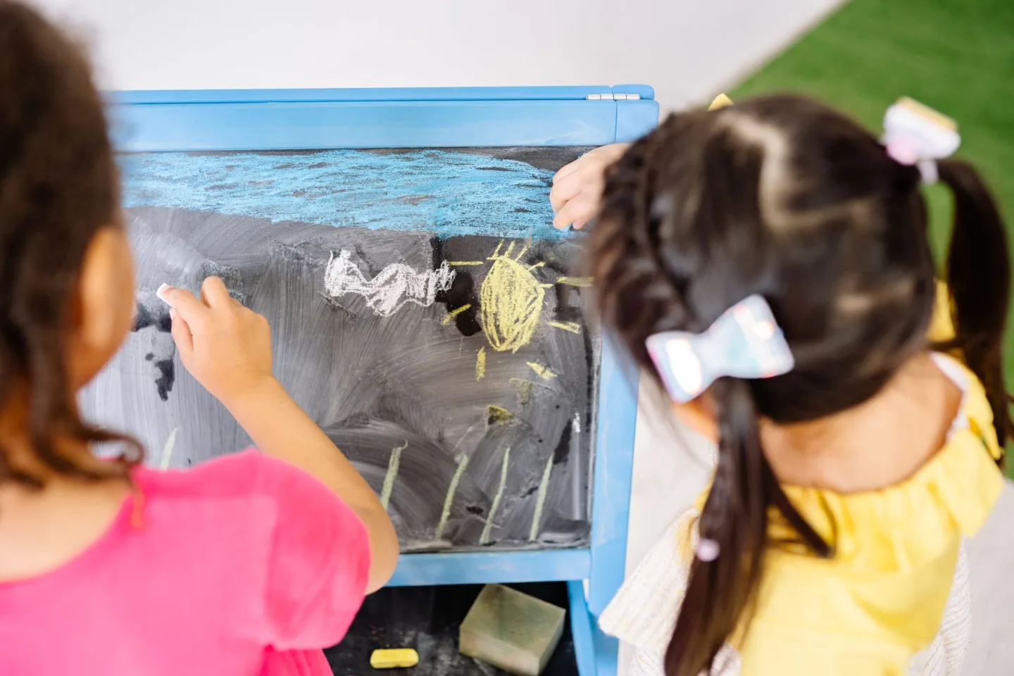 Young children playing together in a preschool classroom